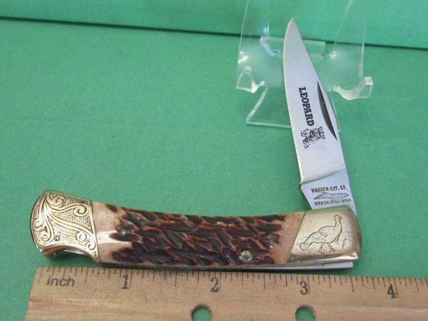 Parker Cut Co. Brown Bone Folding Lock Back 1 of 1 Turkey Etched Bolsters 