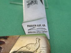 Parker Cut Co. Brown Bone Folding Lock Back 1 of 1 Turkey Etched Bolsters 