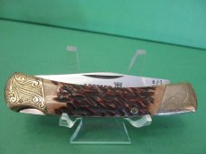 Parker Cut Co. Brown Bone Folding Lock Back 1 of 1 Turkey Etched Bolsters 