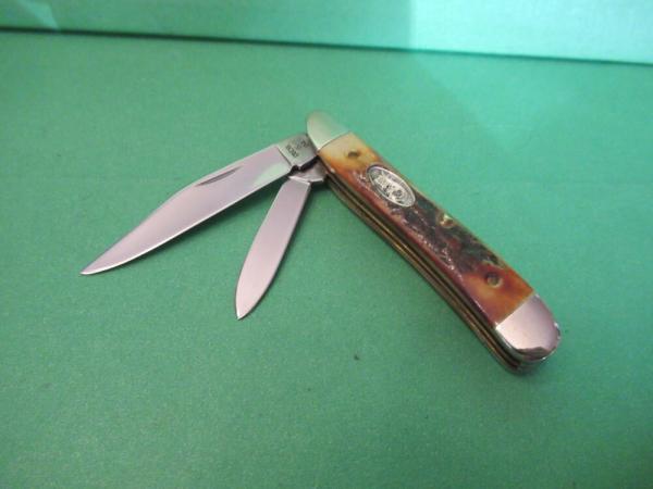 Case XX 1988 Raised Letter Shield Stag Peanut Pattern # 5220 