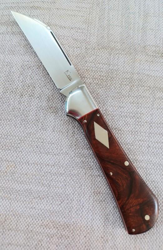 K'roo Custom Raven Knife,,3.75..Desert Ironwood...rwl34. Filework..red G10 spacers/liners..coa/slip