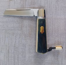 Vincenzo Balistreri Bark Mammoth White Wolf Slipjoint..4" clsd..interior lanyard pin..filework 