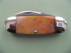DANIELS FAMILY KNIFE BRANDS-TITUSVILLE CUTLERY-MOTHER HUBBARD SUNFISH-SAW CUT AMBER BONE
