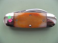 DANIELS FAMILY KNIFE BRANDS-TITUSVILLE CUTLERY-MOTHER HUBBARD SUNFISH-SAW CUT AMBER BONE
