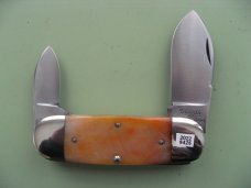 DANIELS FAMILY KNIFE BRANDS-TITUSVILLE CUTLERY-MOTHER HUBBARD SUNFISH-SAW CUT AMBER BONE