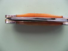 DANIELS FAMILY KNIFE BRANDS-TITUSVILLE CUTLERY-MOTHER HUBBARD SUNFISH-SAW CUT AMBER BONE