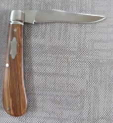 Robbie Ferreira Olive Wood Lannys Clip...N690..4" closed..fluted bolsters and double shields 