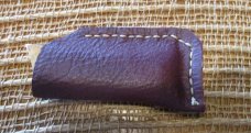Handmade, unsigned, Damascus folding knife with burl and off-white handle 