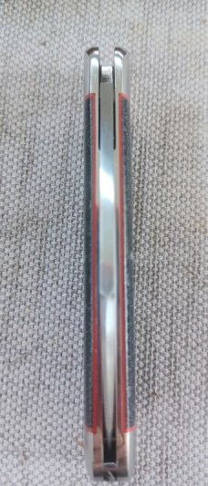K'roo Wharnie Sleeveboard,3.75"cld..Rwl34 long pull..Denim micarta and red accents..Arrowhead Shield