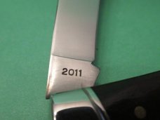 Queen 2011 Swamp Grass Reverse Gunstock Bone Moose Pattern # 50