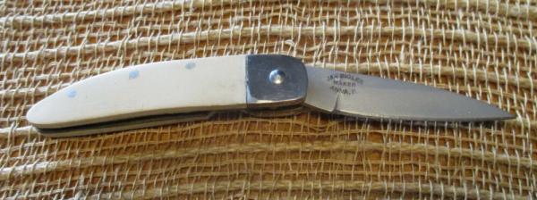 Off-white Jay Bigler folding knife, circa early 2000s