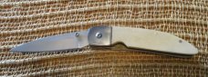 Off-white Jay Bigler folding knife, circa early 2000s