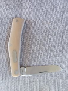 Rhidian Rogue Wave Trapper...Bone Linen micarta. .Cpm154..3.625 cld..red liners..Shield.. slip