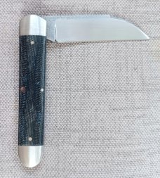 K'roo Wharnie Sleeveboard,3.75"cld..N690 long pull..Denim micarta and Arrowhead Shield..coa&slip