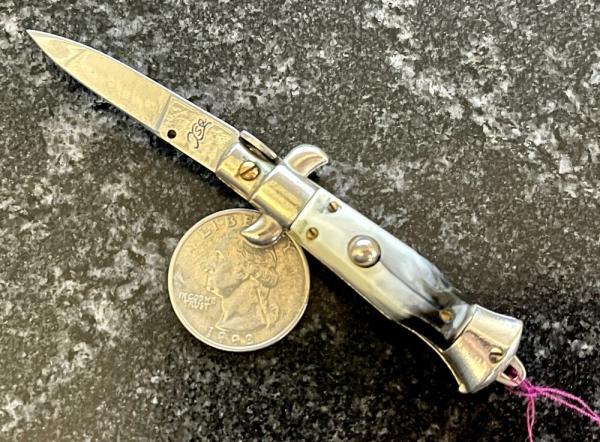 4 Inch Miniature Switchblade Knife, Made In Italy, White & Black Plastic Handle, Unused 4 Inch Miniature Switchblade Knife, Made In Italy, White & Black Plastic Handle, Unused
