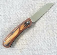 Johan Ellis Lion 4",Birch Burl inlays and Natural Micarta Frame over G10 and titanium..Rwl34..coa 