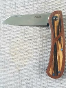 Johan Ellis Lion 4",Birch Burl inlays and Natural Micarta Frame over G10 and titanium..Rwl34..coa 