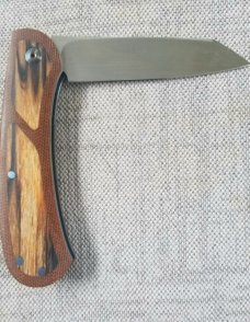 Johan Ellis Lion 4",Birch Burl inlays and Natural Micarta Frame over G10 and titanium..Rwl34..coa 