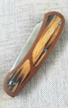 Johan Ellis Lion 4",Birch Burl inlays and Natural Micarta Frame over G10 and titanium..Rwl34..coa 