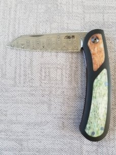 Johan Ellis Lion 4",Damasteel with Giraffe Bone inlays and Paper Micarta Frame over G10 and titanium