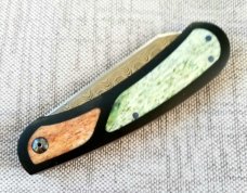 Johan Ellis Lion 4",Damasteel with Giraffe Bone inlays and Paper Micarta Frame over G10 and titanium