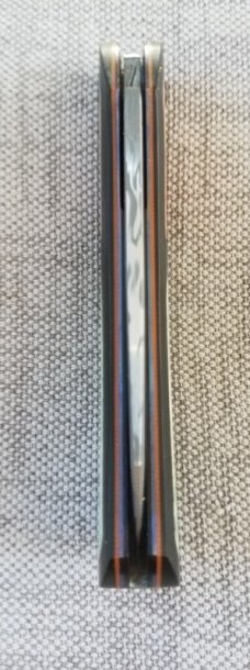 Johan Ellis Lion 4",Damasteel with Giraffe Bone inlays and Paper Micarta Frame over G10 and titanium