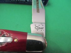 Case XX 2014 Pearl Shield Red Bone Muskrat  1of 300