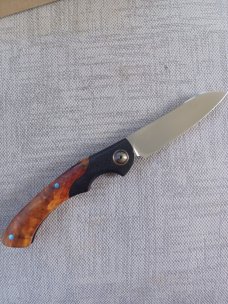 Johan Ellis Springbok...4",Karilian Scales & splated Bolsters...G10 and titanium frame.Rwl34..coa 