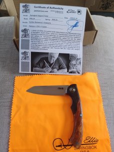 Johan Ellis Springbok...4",Karilian Scales & splated Bolsters...G10 and titanium frame.Rwl34..coa 