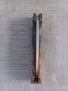 Johan Ellis Springbok...4",Karilian Bolsters..Amboyna scales...G10 and titanium frame.Rwl34..coa 