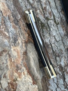 BUCK 110 AUTO BRASS BOLSTER WITH SHEATH & BOX