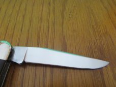 Case XX 1977 Brown Bone Muskrat 