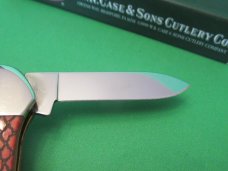 Case XX 2005 Red Rattlesnake Bone Canoe Pattern # 62131 SS