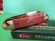 Case XX 2005 Red Rattlesnake Bone Canoe Pattern # 62131 SS