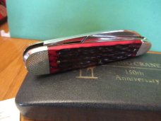 Kissing Crane 150th Anniversary Red Jigged Bone Sleeveboard Whittler 1834 to 1984