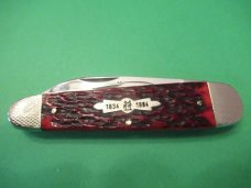 Kissing Crane 150th Anniversary Red Jigged Bone Sleeveboard Whittler 1834 to 1984