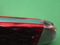 Kissing Crane 150th Anniversary Red Jigged Bone Sleeveboard Whittler 1834 to 1984
