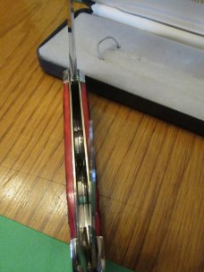 Kissing Crane 150th Anniversary Red Jigged Bone Sleeveboard Whittler 1834 to 1984