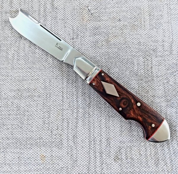 K'roo Ironwood One Arm Easy Open Bullet Head Jack..4" closed..Rwl34..Red liners,fileworked..coa/sl  