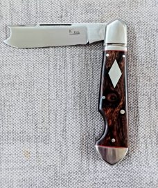 K'roo Ironwood One Arm Easy Open Bullet Head Jack..4" closed..Rwl34..Red liners,fileworked..coa/sl  