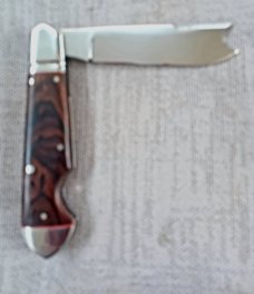 K'roo Ironwood One Arm Easy Open Bullet Head Jack..4" closed..Rwl34..Red liners,fileworked..coa/sl  
