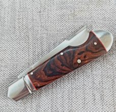 K'roo Ironwood One Arm Easy Open Bullet Head Jack..4" closed..Rwl34..Red liners,fileworked..coa/sl  
