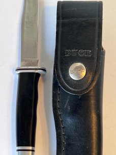 Buck 102 with Sheath.  3 Line Stamp. Light handling and use. 