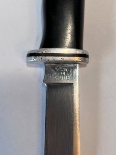 Buck 102 with Sheath.  3 Line Stamp. Light handling and use. 