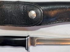 Buck 105, Inverted, 3 line stamp. 1972-1973. Used with sheath