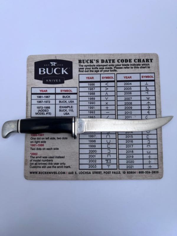 Buck 121, inverted 3 line stamp, with correct sheath. Excellent Condition, 5 5/8" blade length