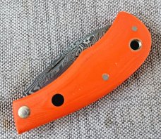 Jeff Pearce Medium Nessie Ultralight..3.5 " closed..Damasteel blade and backspring..Orange G10..coa