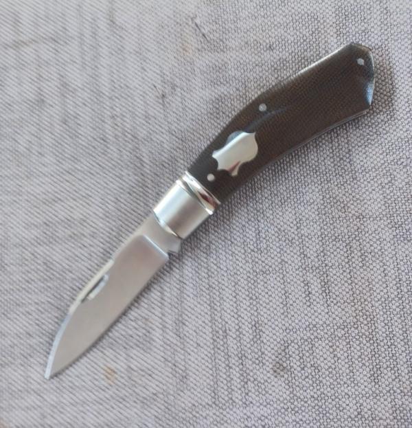 Cosimo Benedetto Dino Slipjoint...Fluted bolsters.. Rwl34..3.75 closed...Canvas MIcarta..coa & slip Cosimo Benedetto Dino Slipjoint...Fluted bolsters.. Rwl34..3.75 closed...Canvas MIcarta..coa & slip