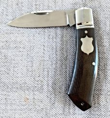 Cosimo Benedetto Dino Slipjoint...Fluted bolsters.. Rwl34..3.75 closed...Canvas MIcarta..coa & slip 