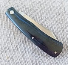Rhidian Shadow Native...Black Linen micarta. .Cpm154..4" cld..white liners and white Shield.. coa